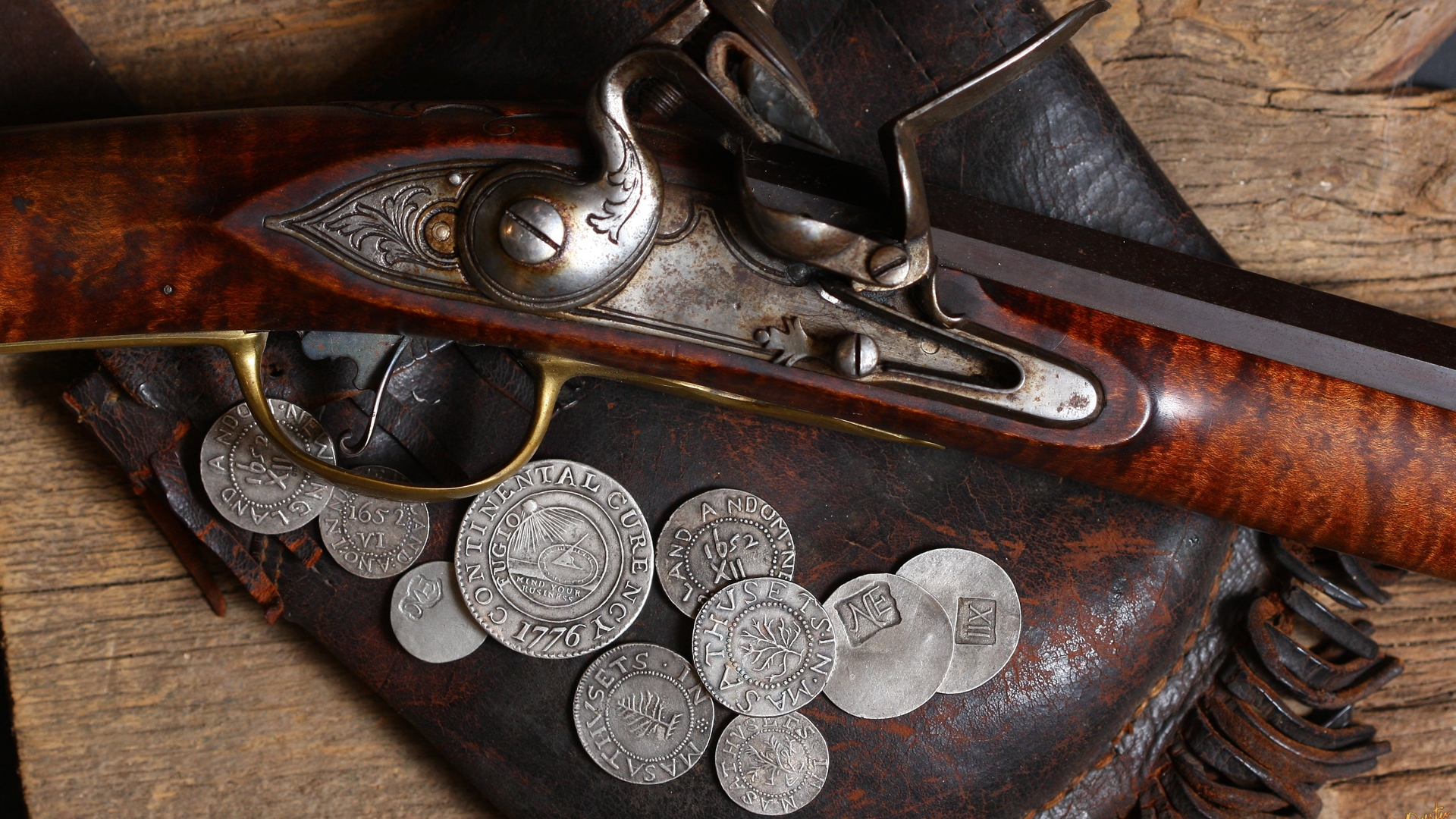 Coin Replicas | Colonial coins with rifle by Gene Austin
